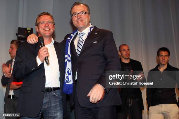 President Clemens Toennies mand head coach Ralf Rangnick sing during the celebration after the DFB Cup final match between MSV Duisburg and FC...