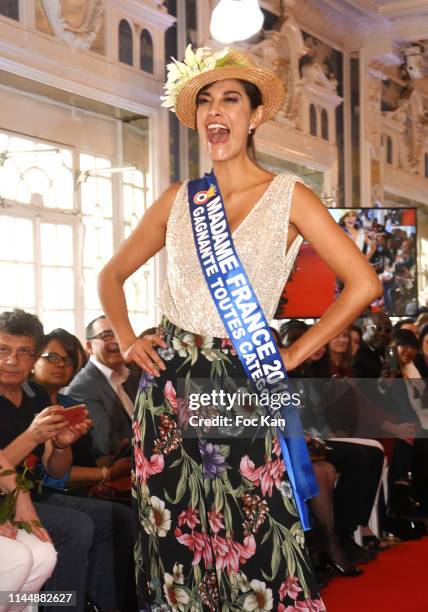 Madame France Toutes Categories Abigail Lopez Cruz wears an hat by designer Mira Belle walks the runway during The Collective show of Roksel design,...