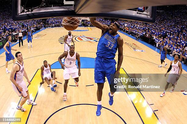 Brendan Haywood of the Dallas Mavericks dunks the ball in the first half while taking on the Oklahoma City Thunder in Game Three of the Western...