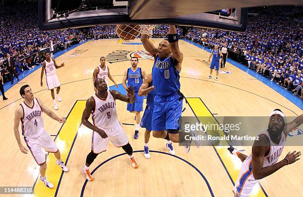 Shawn Marion of the Dallas Mavericks dunks the ball in the first half while taking on the Oklahoma City Thunder in Game Three of the Western...