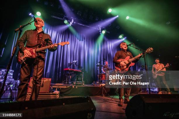 Raymond McGinley, Francis McDonald, Norman Blake and Dave McGowan from the band Teenage Fanclub perform on stage at Rockefeller Music Hall on April...