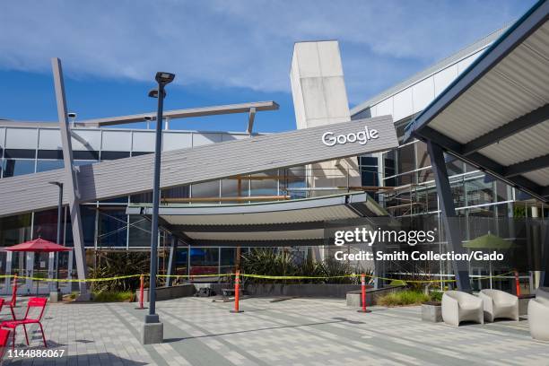 Facade with logo at the Googleplex, headquarters of Google Inc in the Silicon Valley, Mountain View, California, April 13, 2019.