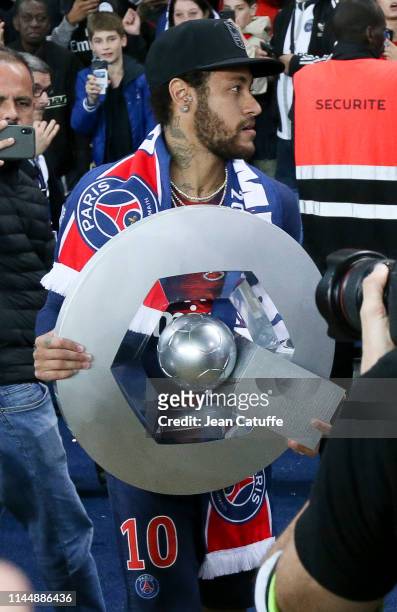 Neymar Jr celebrates winning the 'French Championship 2019' during the trophy ceremony following the French Ligue 1 match between Paris Saint-Germain...