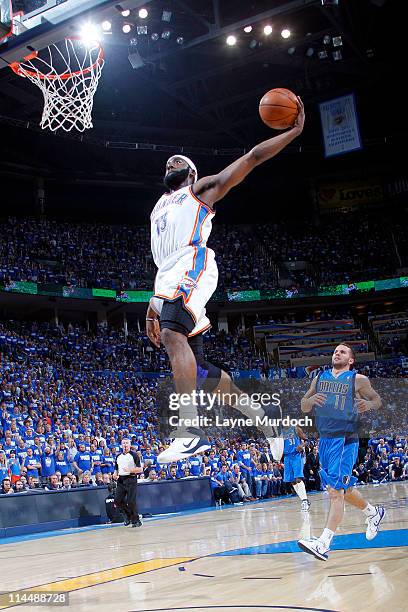 James Harden of the Oklahoma City Thunder dunks against the Dallas Mavericks during Game Three of the Western Conference Finals in the 2011 NBA...