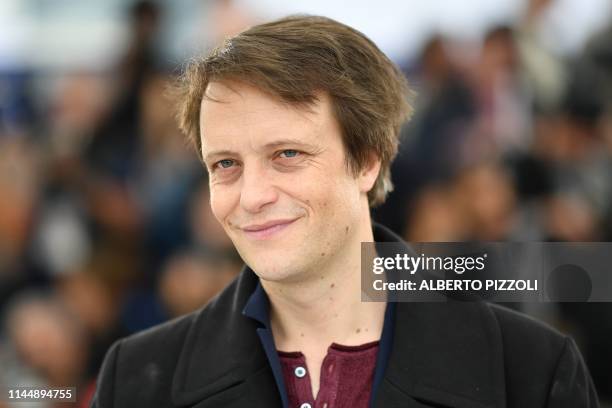 German actor August Diehl poses during a photocall for the film "A Hidden Life" at the 72nd edition of the Cannes Film Festival in Cannes, southern...