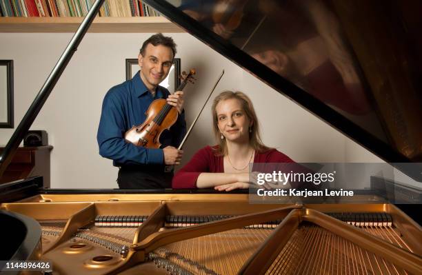 Violinist Gil Shaham and his sister, pianist Orli Shaham, jam informally for a portrait on June 26, 2011 in New York City, New York.