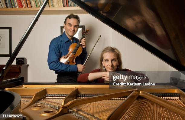 Violinist Gil Shaham and his sister, pianist Orli Shaham, jam informally for a portrait on June 26, 2011 in New York City, New York.