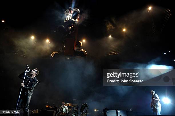 Performs during the U2 360 Tour at INVESCO Field at Mile High on May 21, 2011 in Denver, Colorado.