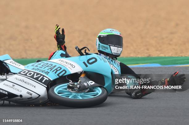 Spanish rider Marcos Ramirez crashes during the Moto3 race of the French Motorcycle Grand Prix in Le Mans, western France, on May 19, 2019.