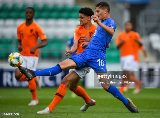 Dublin , Ireland - 19 May 2019; Sebastiano Esposito of Italy in action against Ki-Jana Hoever of Netherlands during the 2019 UEFA U17 European...