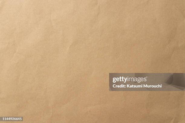striped brown paper texture background - papier kraft photos et images de collection