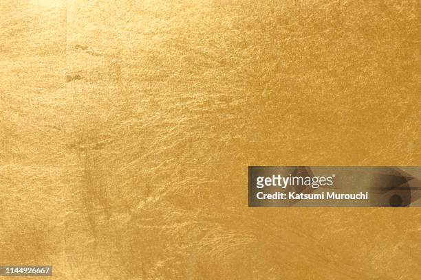 gold leaf texture background - gold coloured stock pictures, royalty-free photos & images
