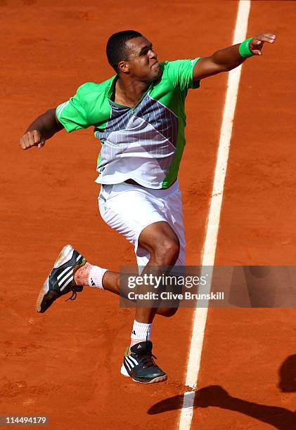 Jo-Wilfried Tsonga of France celebrates match point during the men's singles round one match between Jan Hajek of Czech Republic and Jo-Wilfried...