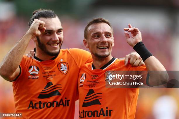 Eric Bautheac and Nicholas D'Agostino of Roar celebrate a goal during the round 27 A-League match between the Brisbane Roar and Adelaide United at...