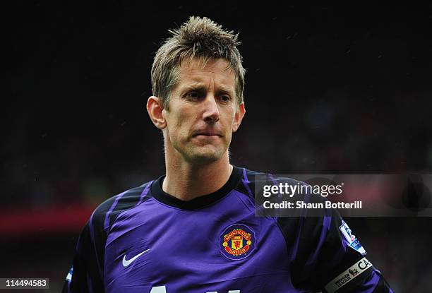 Captain Edwin van der Sar of Manchester United looks on for his final league match prior to the Barclays Premier League match between Manchester...