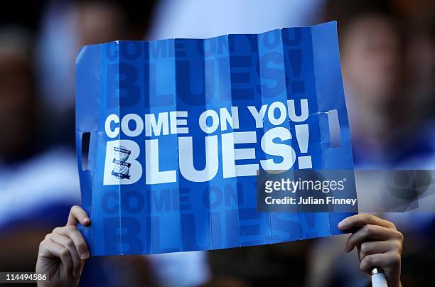 Birmingham City fan holds a banner ahead of the Barclays Premier League match between Tottenham Hotspur and Birmingham City at White Hart Lane on May...