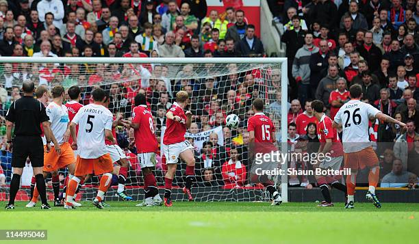 Charlie Adam of Blackpool scores their first goal from a free kick during the Barclays Premier League match between Manchester United and Blackpool...