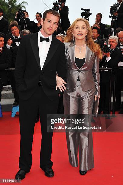 Faye Dunaway and Liam O'Neill attend the "Les Bien-Aimes" premiere at the Palais des Festivals during the 64th Cannes Film Festival on May 22, 2011...