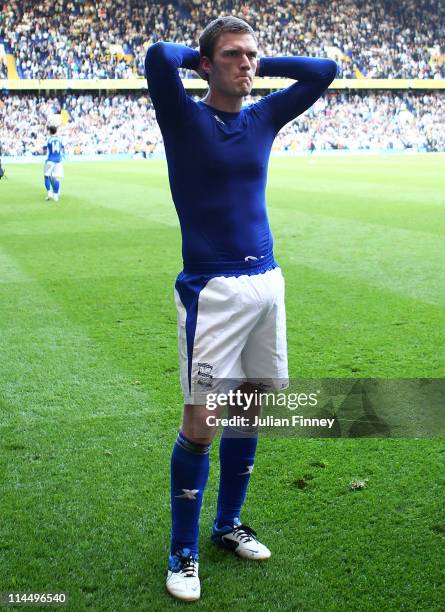 Craig Gardner of Birmingham City looks dejected after his team were relegated during the Barclays Premier League match between Tottenham Hotspur and...