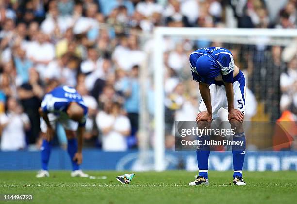 Roger Johnson of Birmingham City bows his head after Birmingham were relegated during the Barclays Premier League match between Tottenham Hotspur and...