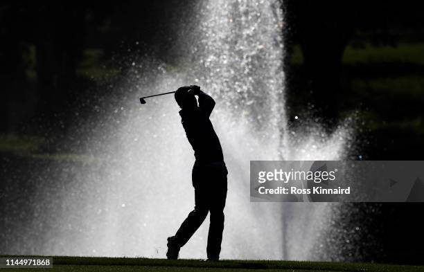 Edoardo Molinari of Italy plays his second shot on the 11th hole during the first round of the Trophee Hassan II at Royal Golf Dar Es Salam on April...