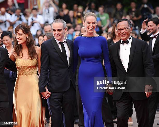 Jury Members Martina Gusman, Olivier Assayas, Uma Thurman, and Johnnie To attend the "Les Bien-Aimes" premiere at the Palais des Festivals during the...