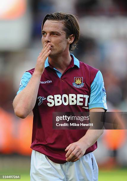 Scott Parker of West Ham blows a kiss to the fans at the end of the Barclays Premier League match between West Ham United and Sunderland at Boleyn...