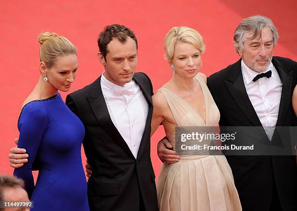 Jury Members Uma Thurman, Jude Law, Linn Ullmann and President Robert De Niro attend the "Les Bien-Aimes" premiere at the Palais des Festivals during...