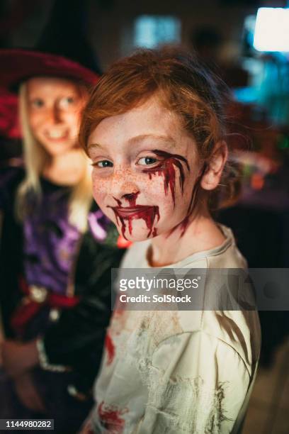 cheerful zombie - halloween zombie makeup stock pictures, royalty-free photos & images