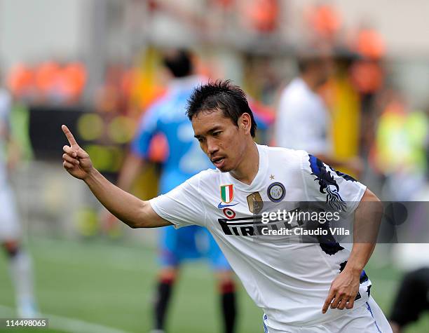 Yuto Nagatomo of FC Inter Milan celebrates scoring the third goal during the Serie A match between FC Internazionale Milano and Catania Calcio at...