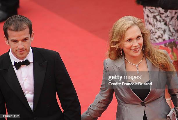 Faye Dunaway and Liam O'Neill attends the "Les Bien-Aimes" premiere at the Palais des Festivals during the 64th Cannes Film Festival on May 22, 2011...