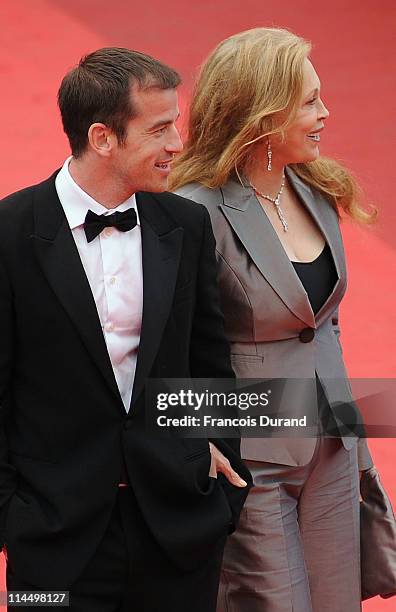 Faye Dunaway and Liam O'Neill attends the "Les Bien-Aimes" premiere at the Palais des Festivals during the 64th Cannes Film Festival on May 22, 2011...