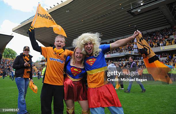 Wolves fans celebrate after the Barclays Premier League match between Wolverhampton Wanderers and Blackburn Rovers at Molineux on May 22, 2011 in...