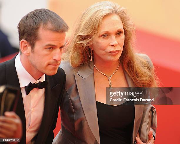 Faye Dunaway and Liam O'Neill attends the "Les Bien-Aimes" premiere at the Palais des Festivals during the 64th Cannes Film Festival on May 22, 2011...