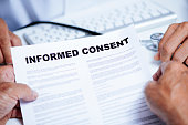 senior man reading an informed consent