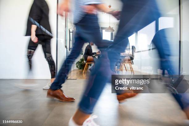on the way to the office - business casual walking stock pictures, royalty-free photos & images