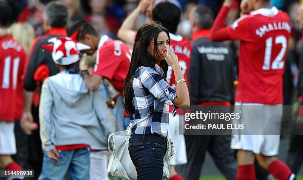 Stacey Cooke wife of Ryan Giggs looks on after the English Premier League trophy presentation after their match against Blackpool at Old Trafford in...