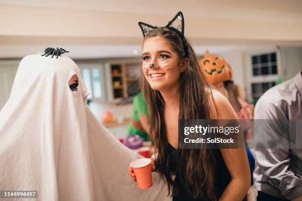 i hope that's not real! - cat costume stock pictures, royalty-free photos & images
