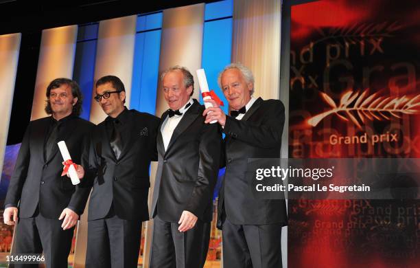 Un Certain Regard Jury President Emir Kusturica poses with director Nuri Bilge Ceylan for "Once upon a time in Anatolia",and directors Luc...