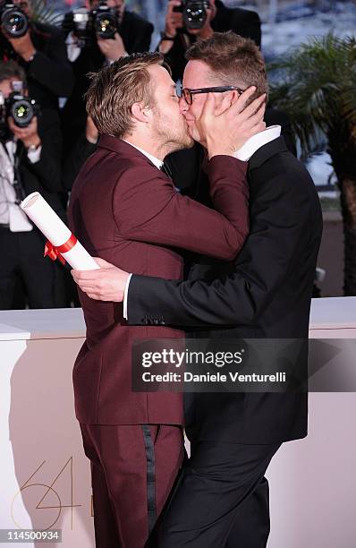 Actor Ryan Gosling congratulates Director Nicolas Winding Refn after he wins Award for Best Director for his film "Drive" during the Palme D'Or...