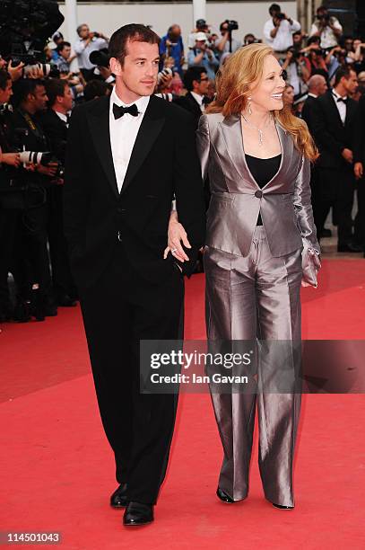 Faye Dunaway and Liam O'Neill attend the "Les Bien-Aimes" premiere at the Palais des Festivals during the 64th Cannes Film Festival on May 22, 2011...