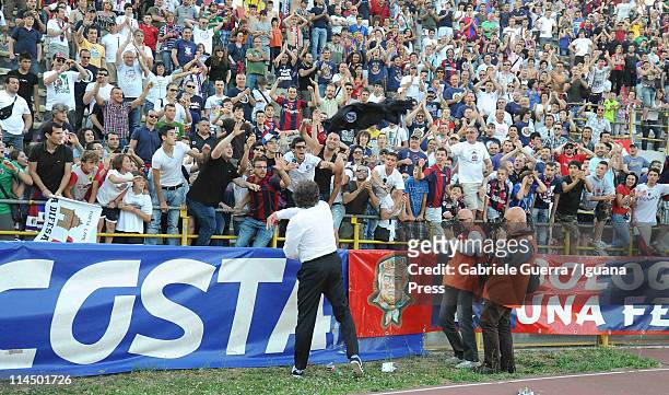 Alberto Malesani head coach of Bologna throws his jaket to supporters during the Serie A match between Bologna FC and AS Bari at Stadio Renato...