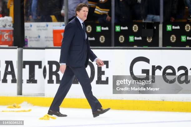 Head Coach Mike Babcock of the Toronto Maple Leafs exits the ice after the Maple Leafs lost 5-1 to the Boston Bruins in Game Seven of the Eastern...