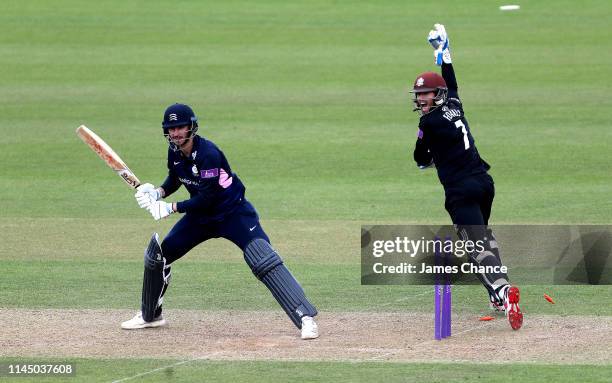 Wicketkeeper Ben Foakes of Surrey celebrates after stumping Toby Roland-Jones of Middlesex who reacts during the Royal London One Day Cup match...