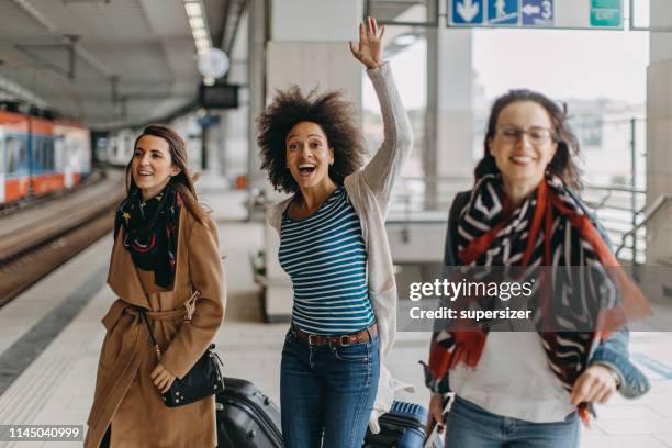 Friends Catching Train Person Catching Train Photos and Premium High Res Pictures - Getty Images