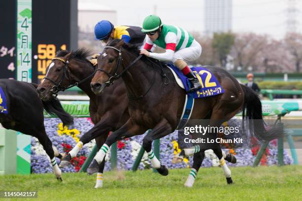 Jockey Christophe Lemaire riding Saturnalia wins the Satsuki Sho at Nakayama Racecourse on April 14, 2019 in Funabashi, Japan. It is the first leg of...