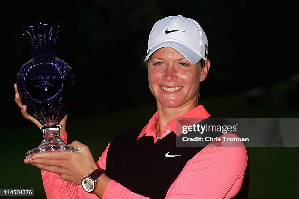 Suzann Pettersen of Norway reacts after holing a birdie putt on the 18th green to defeat Cristie Kerr in the final of the Sybase Match Play...