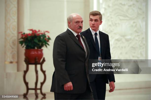 Belarus President Alexander Lukashenko and his son Nikolai Lukashenko leave after the meeting with Chinese President Xi Jinping during the Second...