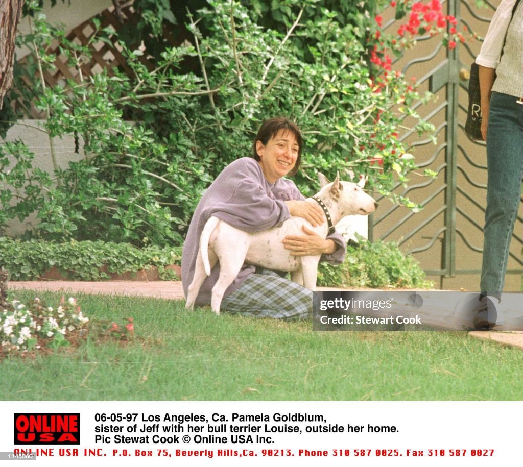 06-04-97 Los Angeles, Ca. Pamela Goldblum, sister of Jeff with her bull terrier outside her home.