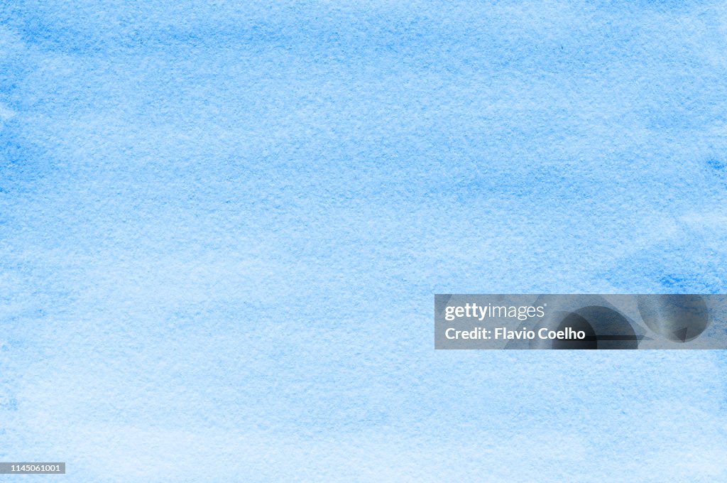 Light blue watercolor background